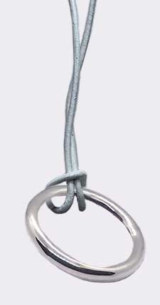 Cock ring worn as a silver pendant necklace