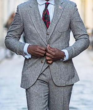 Man in a tweed suit representing discreet men's personal style