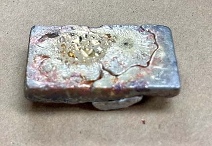 Silver ingot representing refined silver used to make jewellery
