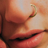 Adjustable non-piercing gold plated body rings for men.