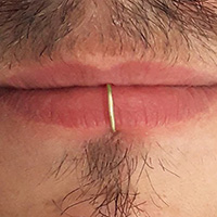 Non-piercing fake lip rings for men in solid silver.