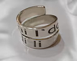 toe ring with engraving.