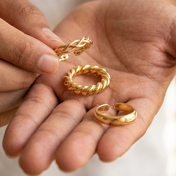 Custom-made silver and gold-plated cock rings by Hidden Delites